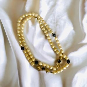 Vintage DAUPLAISE faux pearl / fleur de lis & patented clasp 37”